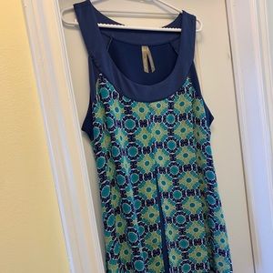 Sheer tank top with flowing bottom